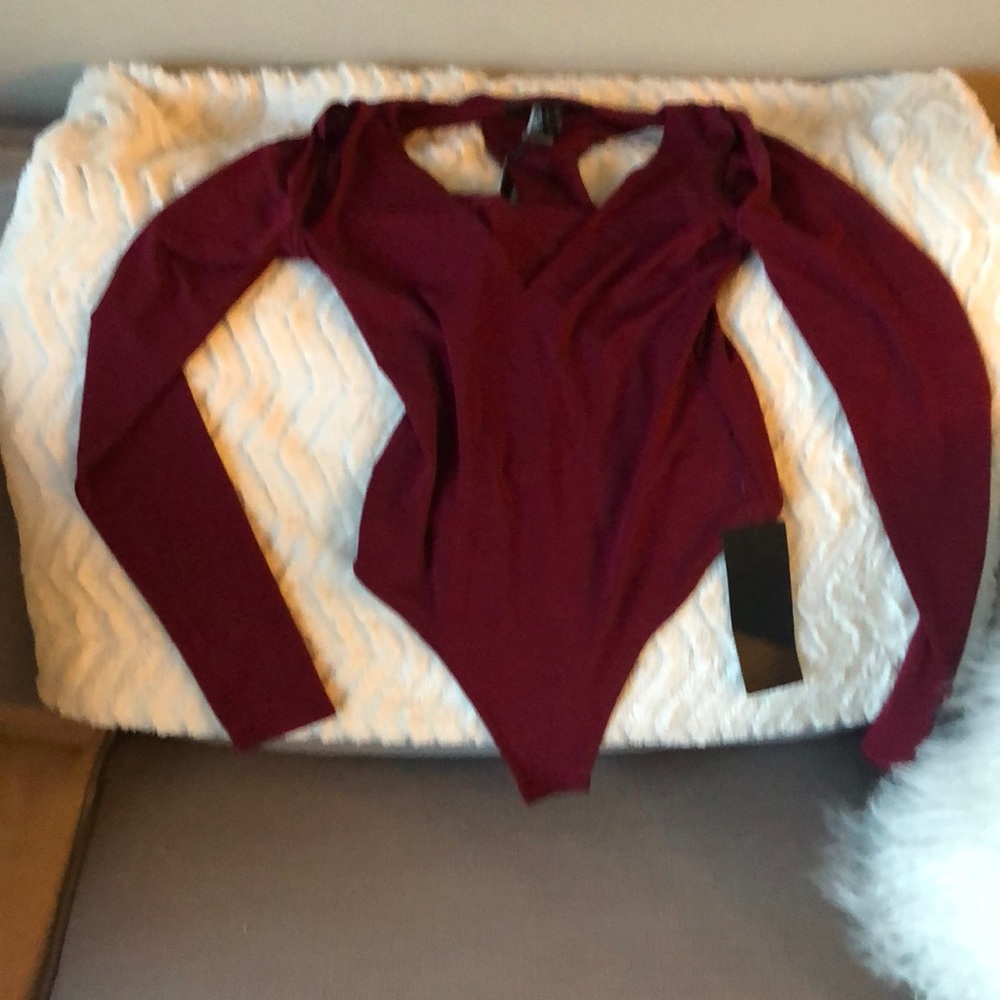 Brand new BCBG body suit